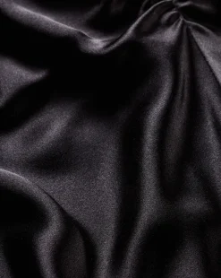 Clover Stretch Silk Midi Skirt in Black